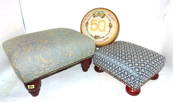 A group of three 20th century upholstered footstools with tapering supports, the largest 46cm wide x 26cm high and another with bun feet and one furth