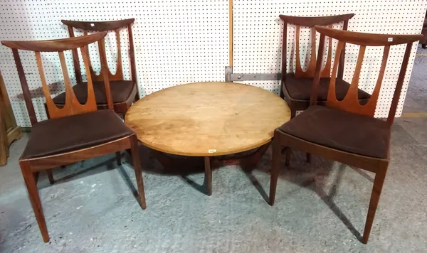 A 20th century G-Plan style circular coffee table on 'X' frame base, 90cm wide x 38cm high and a set of four G-plan teak stick back dining chairs, (5)