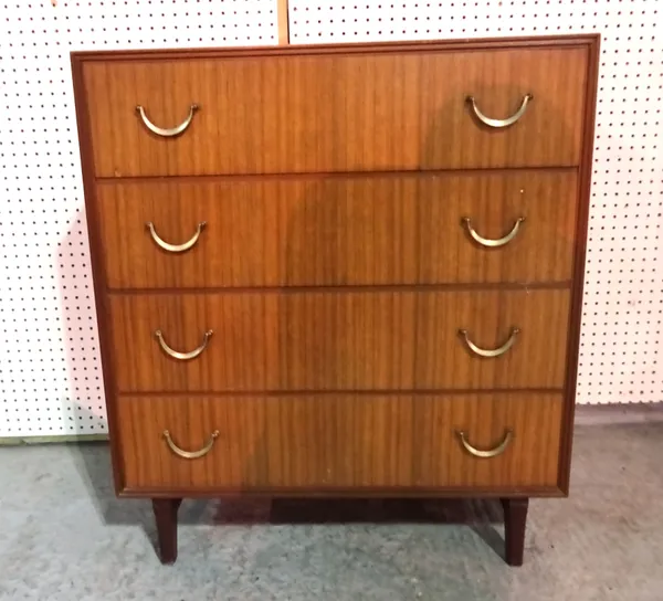 A  20th century teak chest of four long drawers on tapering supports, 76cm wide x 86cm high.  L7