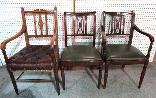 A set of six Regency style mahogany dining chairs on octagonal tapering supports, to include two carvers and another oak open armchair, (7).   BAY 3