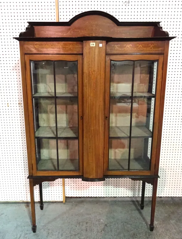 An early 20th century mahogany two door display cabinet on tapering square supports, 109cm wide x 179cm high.  BAY 3