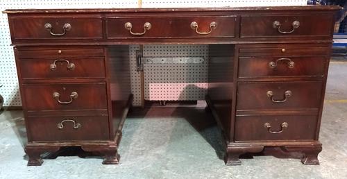A 20th century mahogany pedestal desk with inset green leather top, 154cm wide x 80cm high.  H4