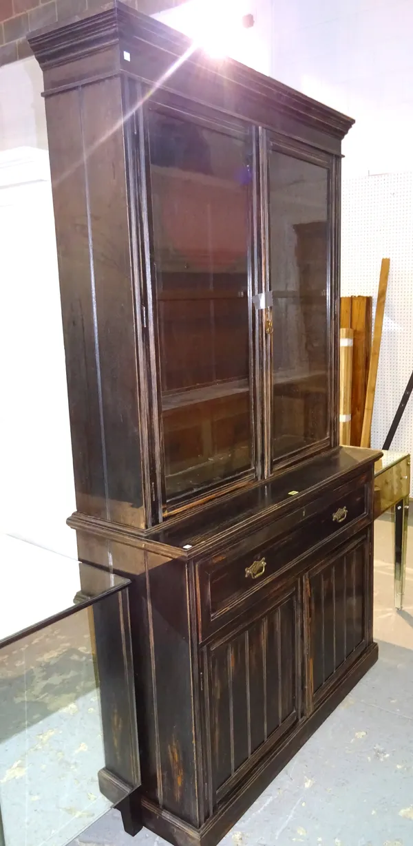 A 20th century black painted bookcase cabinet with secretaire drawer over cupboard, 123cm wide x 232cm high.  L9
