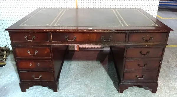 A 20th century mahogany pedestal desk with inset green leather top, 153cm wide x 75cm high.  I4
