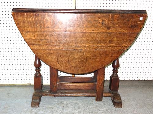 An 18th century oak drop flap table, 92cm wide x 72cm high.  BAY 3