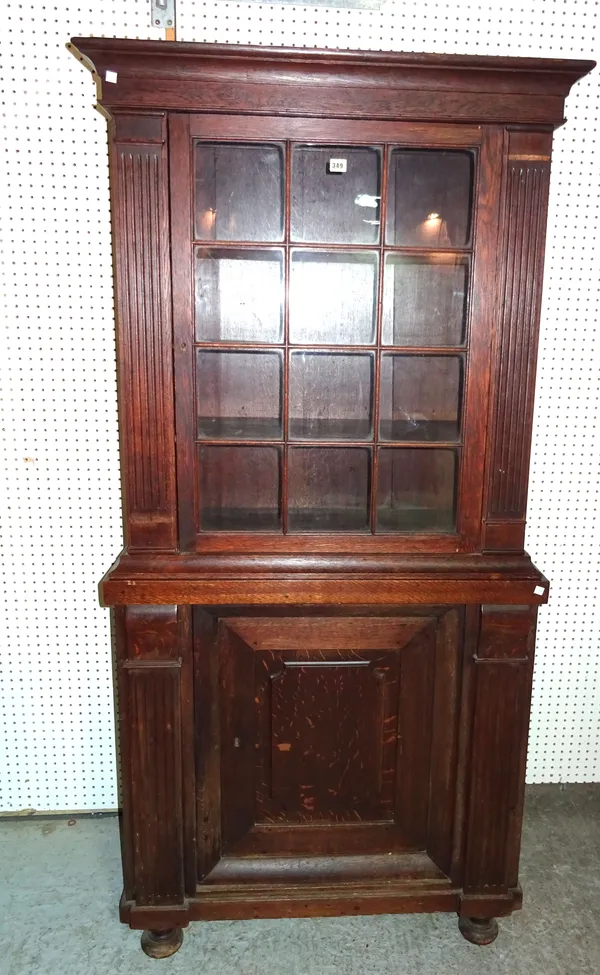 A 19th century continental oak display cabinet cupboard, 95cm wide x 190cm high.  BAY 1