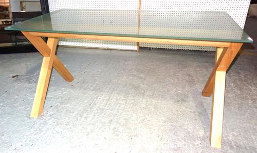 A 20th century rectangular frosted glass dining table on hardwood 'X' frame base, 140cm wide x 72cm high.  H9
