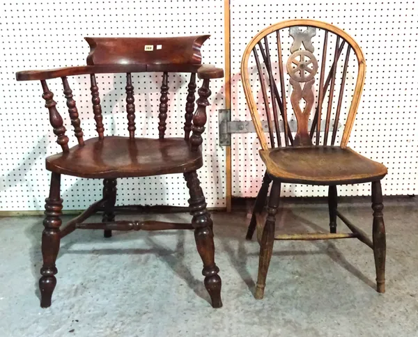 An early 20th century elm Captain's open armchair with bobbin turned supports and a wheelback dining chair.  BAY 2