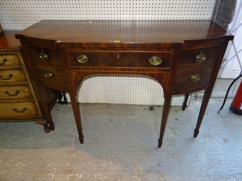 A late George III mahogany breakfront sideboard on tapering square supports, 136cm wide x 91cm high.  BAY 1