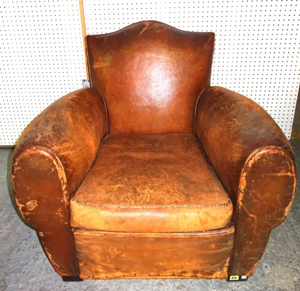 An early 20th century French club armchair with tan leather upholstery, 87cm wide. E6