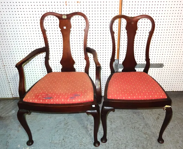 A set of eight Queen Anne style mahogany vase back dining chairs on tapering pad feet, (8). E4