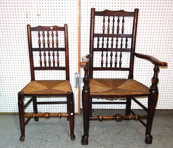 A set of six 19th century ash and elm spindle back dining chairs with rush seats, (6).   BAY 2