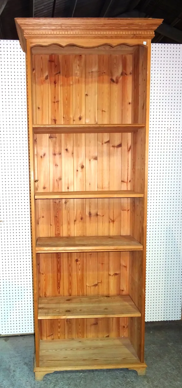 A 20th century tall pine bookcase 55cm wide x 224cm high.  M7