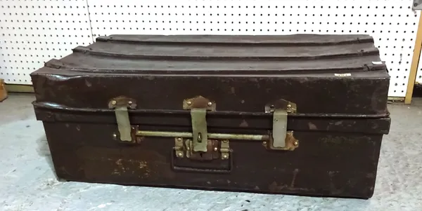 An early 20th century painted tin travelling trunk, 76cm wide x 28cm high.    I6