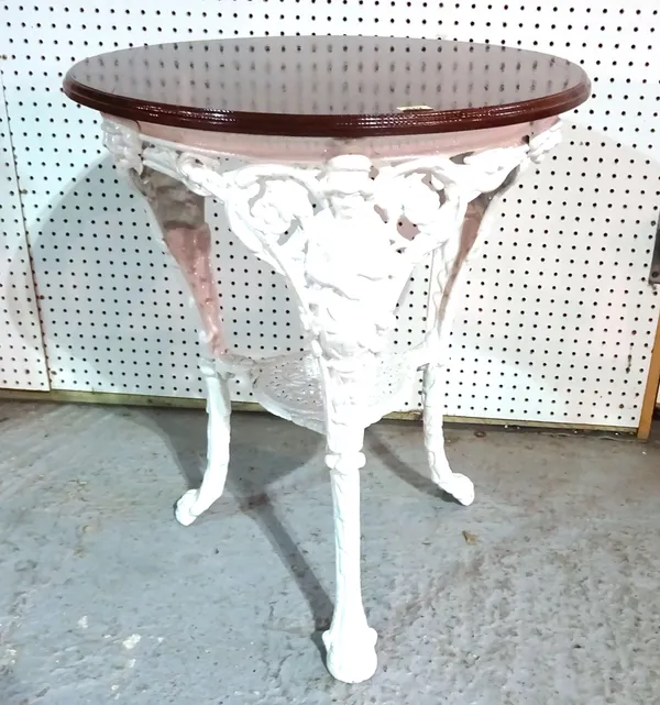 A white painted cast iron pub table with circular mahogany top, 53cm wide.  BAY 1