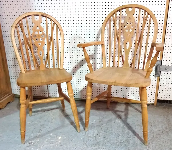 A set of eight 20th century beech framed wheelback dining chairs, on turned supports, to include a pair of carvers, (8).  BAY 2