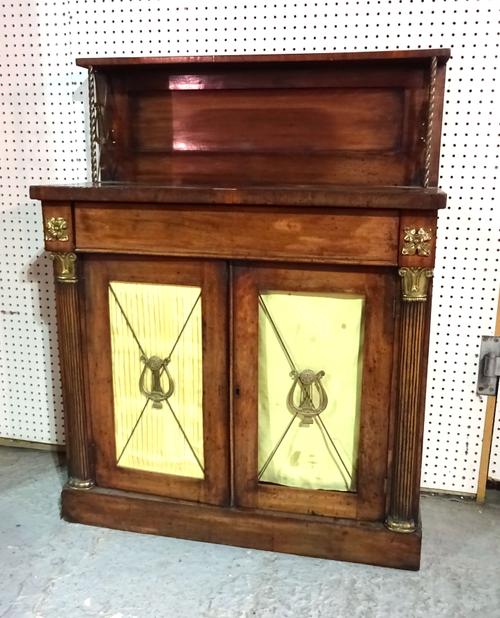 A Regency gilt metal mounted mahogany chiffonier with ledge back, single drawer and pair of cupboards, 91cm wide x 116cm high.  BAY 3