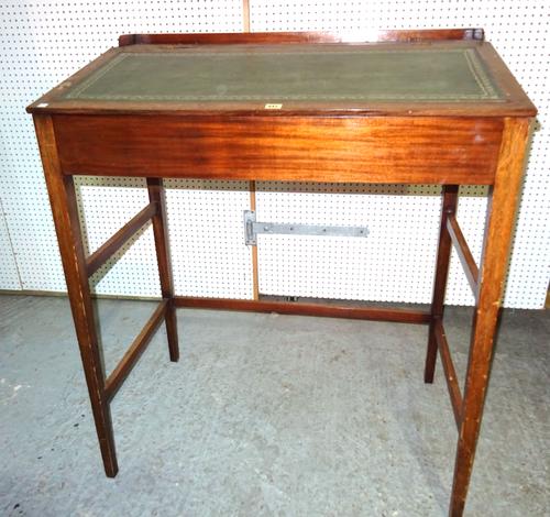 An early 20th century mahogany clerks desk with leather inset and galleried top on tapering square supports, 101cm wide x 110cm high.   F10