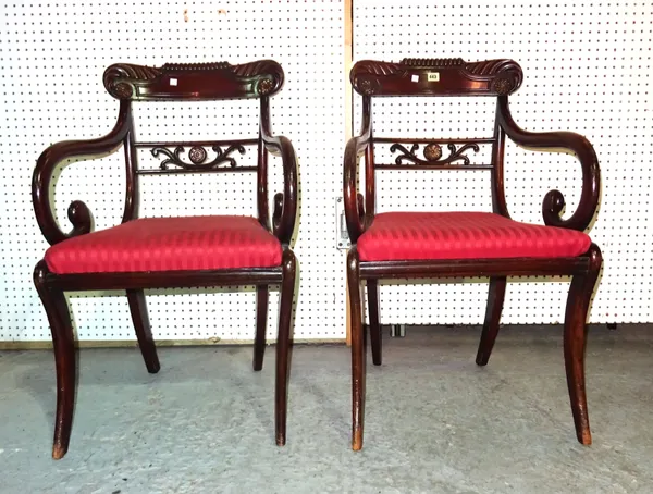 A pair of Regency style mahogany and parcel gilt open armchairs, (2).  H8