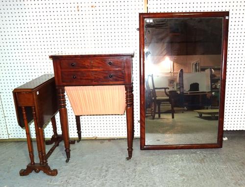 A 19th century mahogany two drawer work table on ring turned supports, 51cm wide x 71cm high, an early 20th century mahogany Sutherland table, 51cm wi
