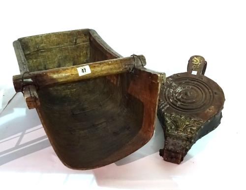An early 20th century wooden grain scoop and a pair of carved walnut bellows.  S3B