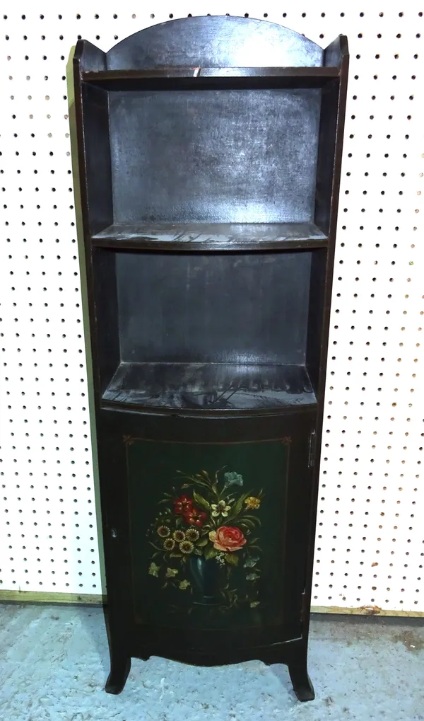 An early 20th century ebonised and floral painted three tier bookcase cupboard, 31cm wide x 100cm high.  BAY 1