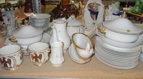 A pair of 19th century French porcelain wine coolers with Napoleon's coat of arms 10cm high, a continental gilt and white porcelain shallow bowl and a