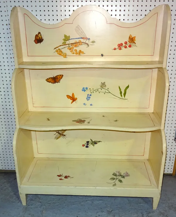 A 20th century cream painted waterfall bookcase decorated with butterflies and dragonflies, 90cm wide x 122cm high.  H5