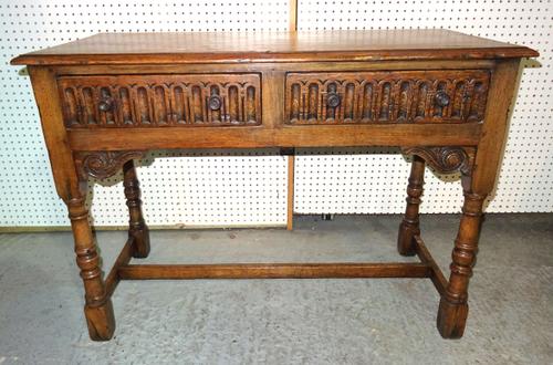 A 20th century oak dresser base with two drawers on turned block supports, 107cm wide x 76cm high and a mahogany swing frame mirror, 46cm wide x 55cm