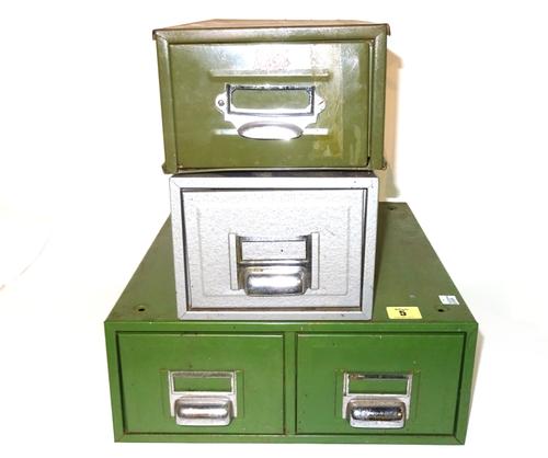 A 20th century green painted metal two drawer filing box and two single drawer metal filing boxes, the largest 35cm wide x 15cm tall (3).   S2M