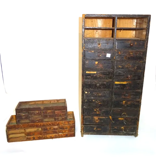 A group of six small stained pine watchmaker's tool boxes, each with a variety of small drawers, the largest 32cm wide x 47cm tall, (6).  S2B