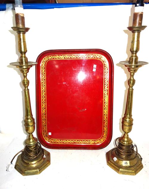 A pair of 20th century brass altar candlesticks on tapering columns and hexagonal bases, later converted into lamps, 79cm high and an early 19th centu