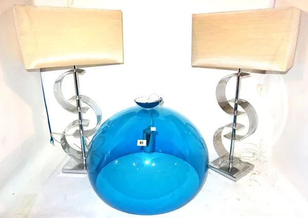 Lighting, including; a blue perspex dome ceiling light, 51cm diameter and two polished metal lamps with shades, (3).   S1T