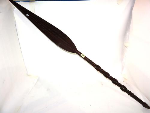 An early 20th century carved hardwood tribal style paddle. CAB