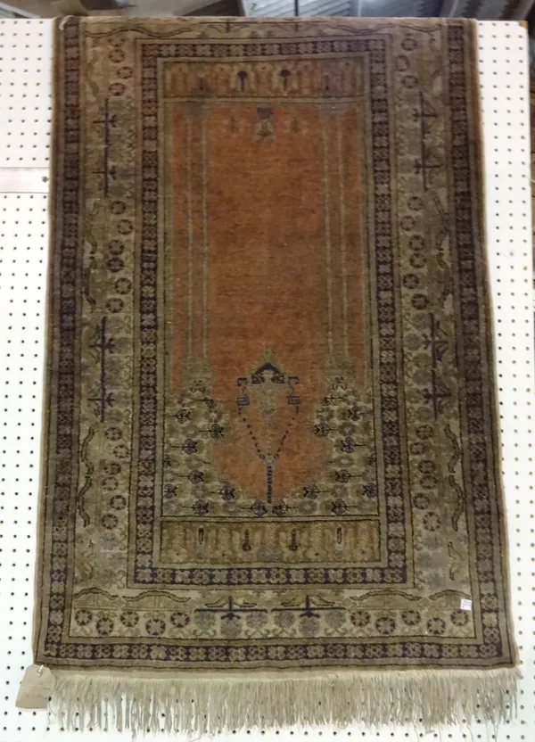 A Tekke Turkman rug, 164 x 119cm and a Turkish prayer rug, 134 x 84cm, (2).  H6
