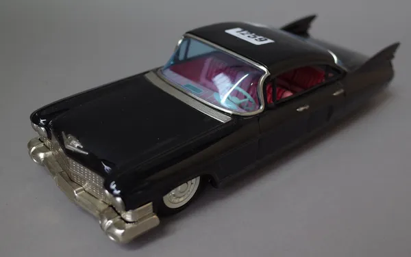 A Bandai Cadillac Sedan No 781, circa, 1960, black livery, friction drive, from 'Automobiles of the World' series, 29.5cm.