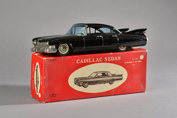 A Bandai Cadillac Sedan No 781, circa 1960, black livery friction drive, from 'Automobiles of the World' series, boxed, 29.5cm. Illustrated.