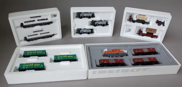 Marklin HO gauge railway comprising, 48664 'Steel Slabs' heavy duty flat car set, 48781 car set, 46290 'Spirits Car', car set, 47905 'mobile Sawmill'