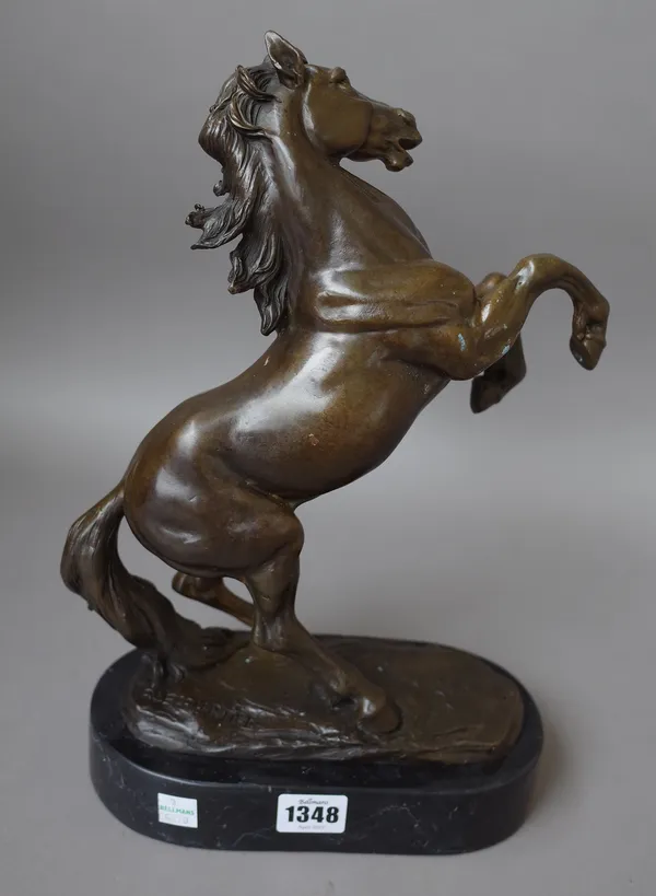 A modern bronze horse on a black marble plinth, signed 'P. Lecourtier', to the case, 35cm high overall.