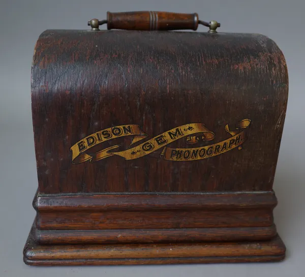 An Edison 'Gem' phonograph in an oak case.