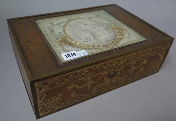 A French leather bound box, late 19th century, foliate embossed, with brass banding and central print to the hinged lid, 34cm wide.