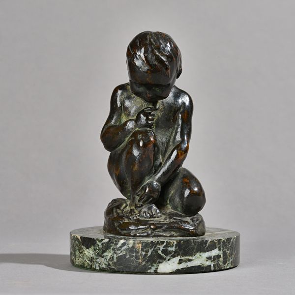 Lucy Gwendoline Williams (1870-1955), a patinated bronze figure of a crouching child on a circular green variegated marble plinth, signed 'L.G.W' to t