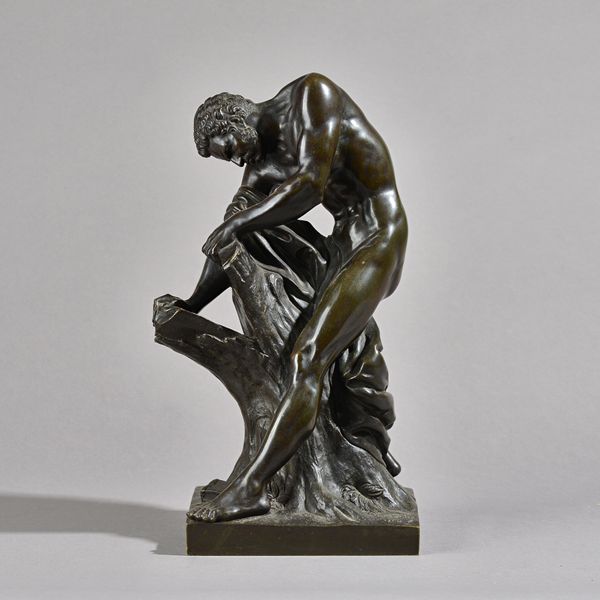 After Edme Dumont (French 1722-1775), a late 19th century bronze, Milo of Croton, the figure on an integral square base. (29cm high). Illustrated.