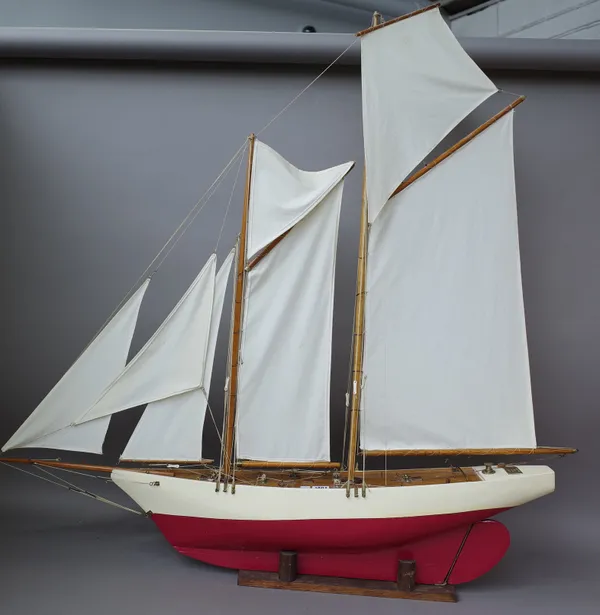 'Osprey', a schooner rigged yacht, built circa 1920, restored, 2010, on a wooden stand,  115 cm high.