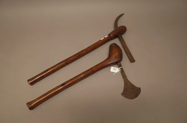 A Central African (Congo) yam axe (44cm) and a Central African (Congo) Prestige axe, both hardwood and iron, (2).