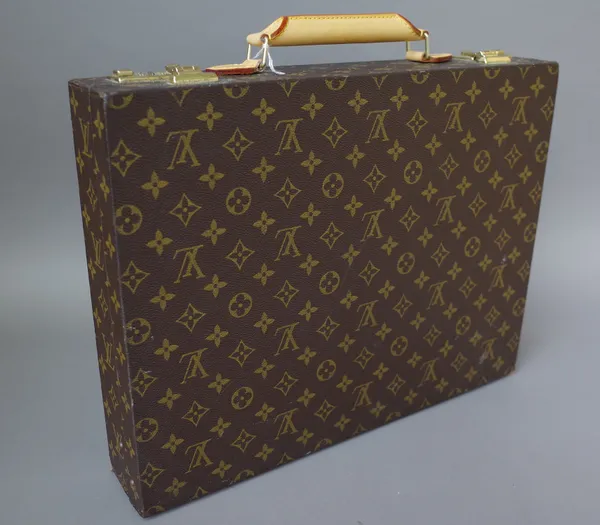 A Louis Vuitton briefcase with monogrammed canvas and brass hardware, 43cm wide x 32cm x 7.5cm.