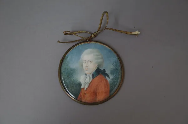 Attributed to Heinrich Friedrich Fuger (1751-1818) a portrait miniature on ivory of a gentleman, red coat grey wig, foliage background, bears signatur