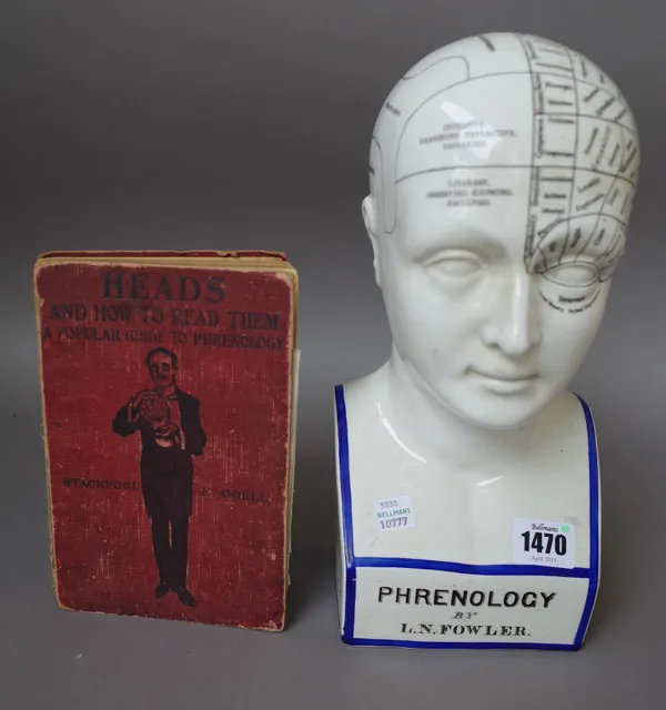 A pottery phrenology bust, titled to the front 'Phrenology by L.N. Fowler, 28cm high and a book by E.Odell; 'Heads and how to read them a popular guid