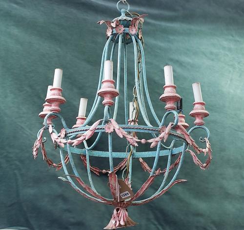 A modern painted metal eight branch chandelier of circular open frame form, turquoise and pink painted, the sconces united by garlands, 82cm high and