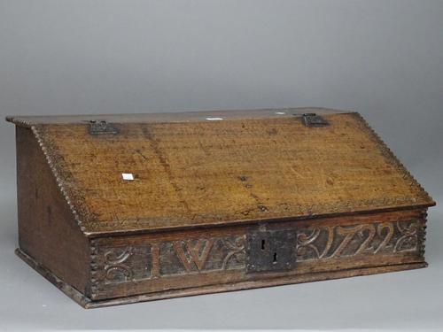 An early 18th century slope front bible box with initials IW 1722, 75cm wide x 29cm high.